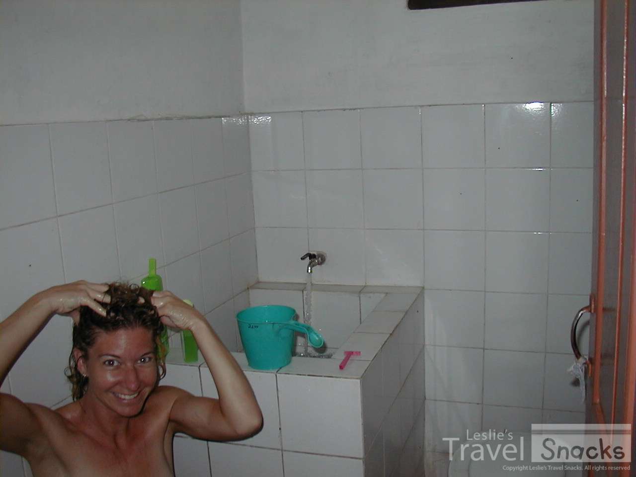 That basin plus the ladle = bathing shower.