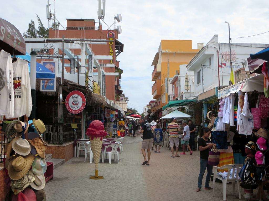 Ave Hidalgo is the main drag on Isla Mujeres with bars, restaurants, and shops. We always have a good laugh at that blood-red ice cream cone.
