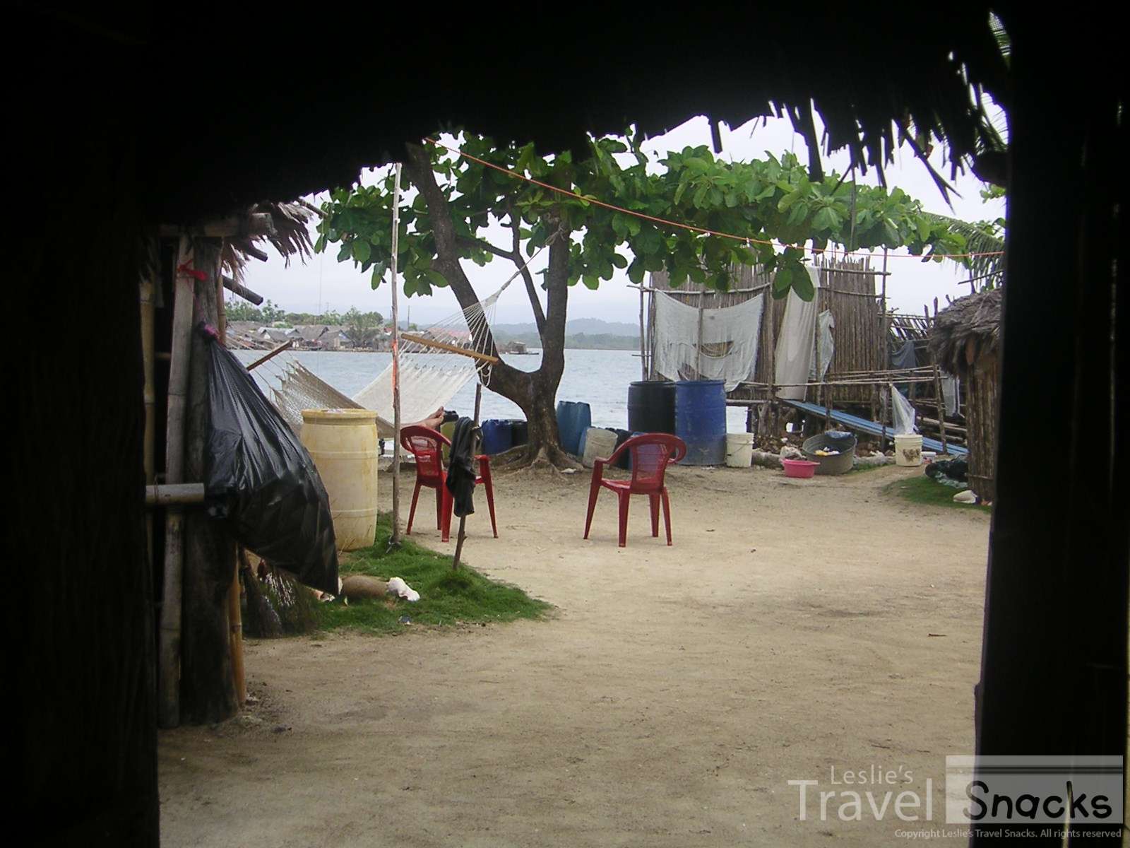 That raised outhouse across the courtyard on the right was my toilet in San Blas. It's just a seat with a hole that drops right into the water. Everyone can see what's coming out!