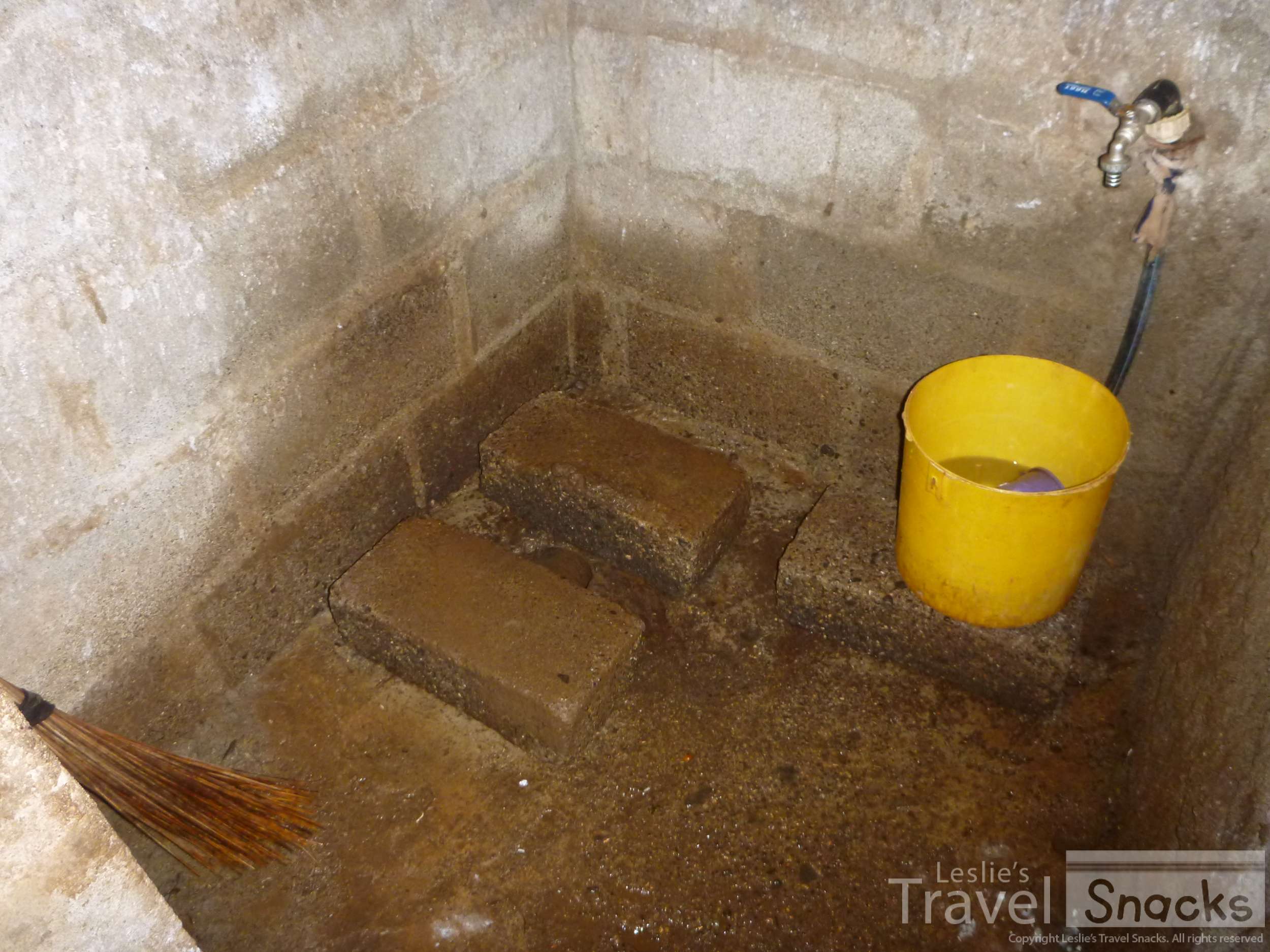 This was a toilet in a rather nice house in Africa. Try aiming at that tiny hole first thing in the morning!